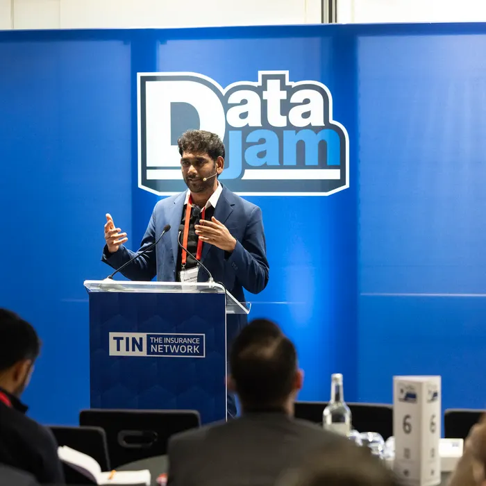 Banu delivering the keynote at DataJam